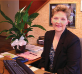 Mary at her desk
